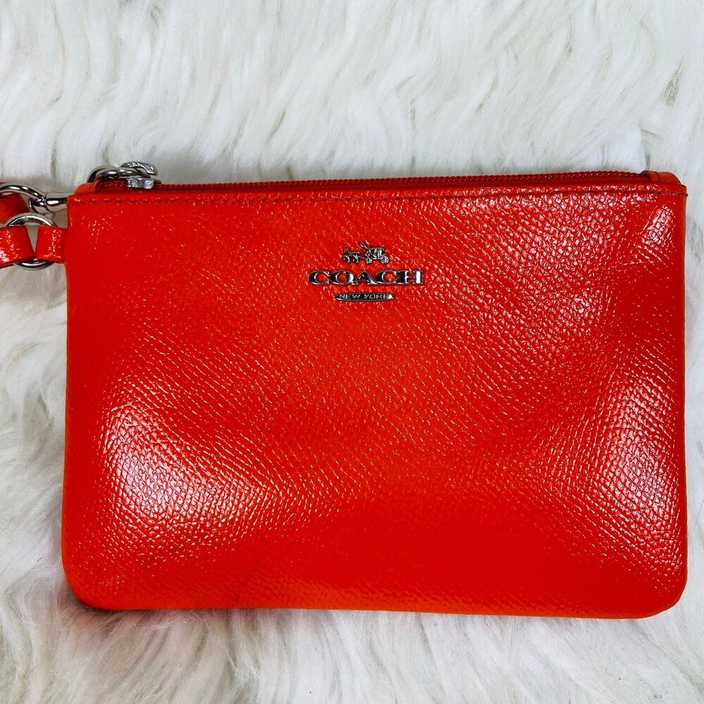 Coach Orange Corner Zip Wristlet